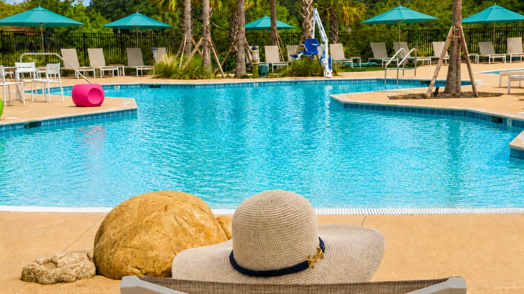 Relaxing by the heated pool at Tropic Hideaway